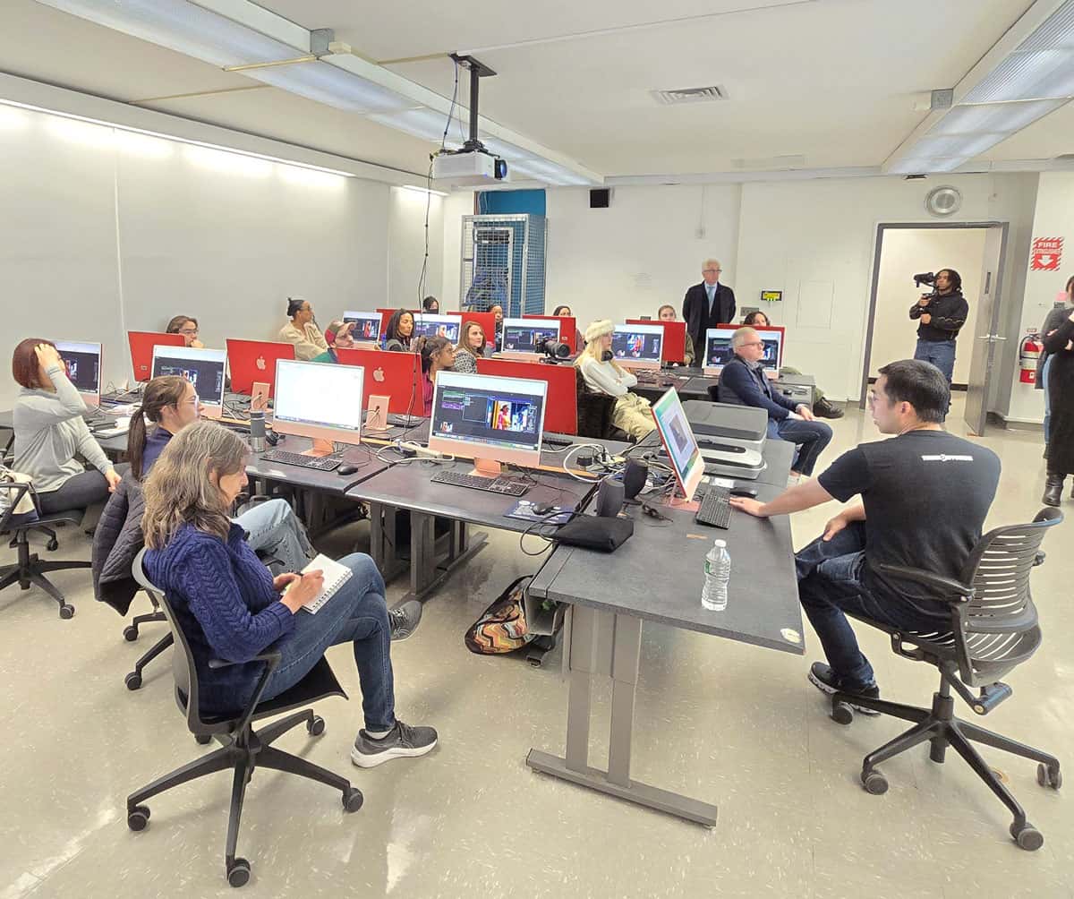 Students working in a fashion class computer lab